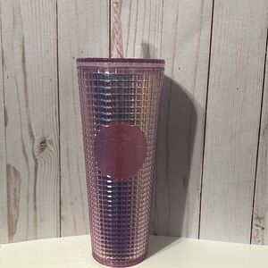 Pink Starbucks cup with lid and straw 24oz
